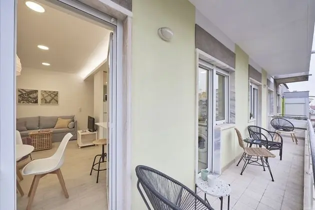 Light Apartment W/ Balcony Apartment by TimeCooler - 1