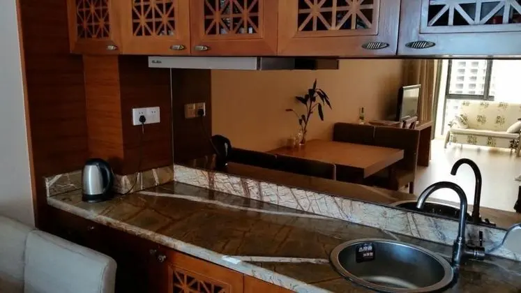 Lingshui Sea View Vacation Apartment - Mutfak