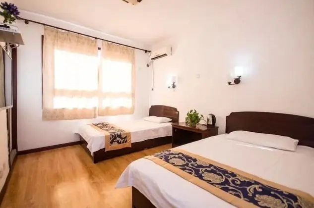 Liuzhuang Huayuhai Holiday Hostel - Oda