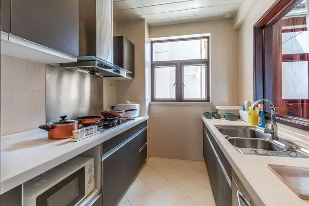 Locals Boutique Apartment Huafa Plaza 36 - Mutfak