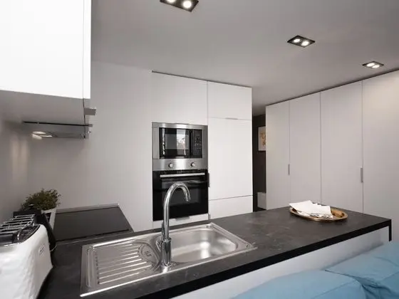 Lofts Cracow Apartments - City Center - Mutfak