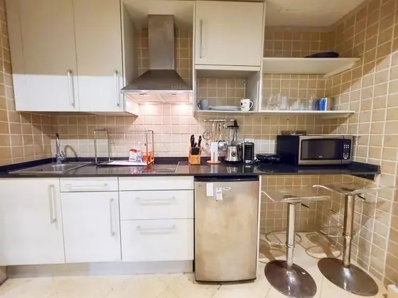 Los Corales Cozy Garden Views Condo C202 - Oda