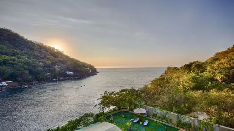 Luna Suite With two King Size Beds, With Walk out Terrace Overlooking the Beach