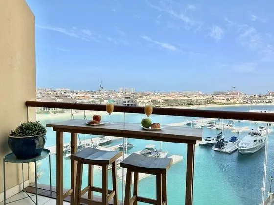 Luxury on the Palm with Marina view balcony