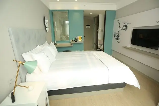 Magnotel Hotel of Qingdao JIAOZHOU, Guangzhou south road hotel - Oda