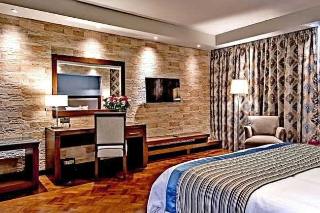 Magna Hotel and Suites - Öne Çıkan Resim