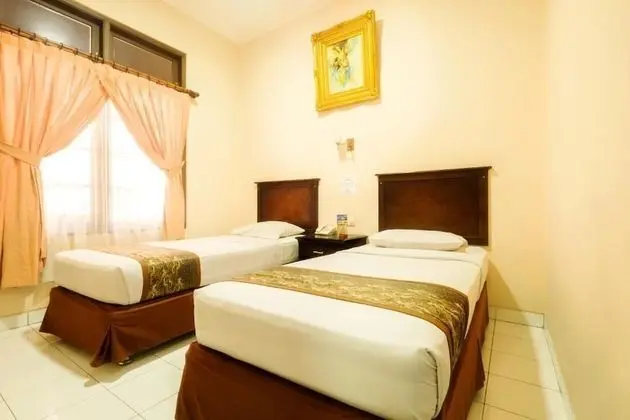 Malioboro Inn Yogyakarta - Oda
