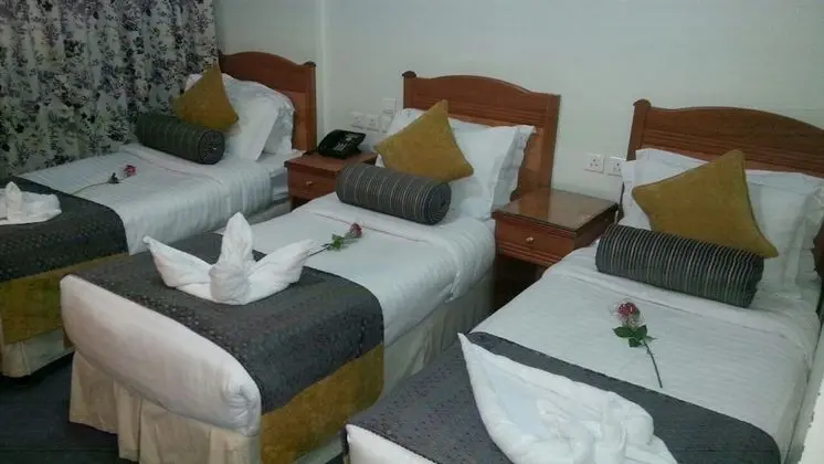 Manarat Al Taj Hotel - Oda