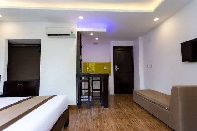 Manchester Hotel & Apartment - Oda