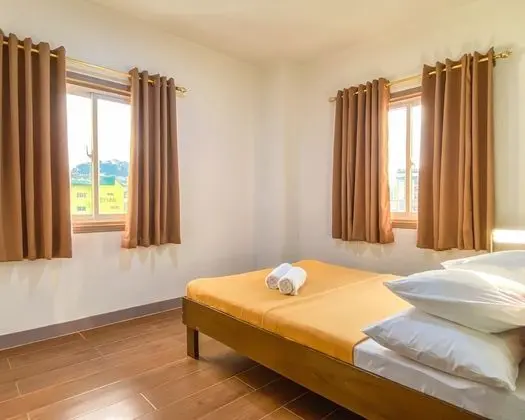 Metro Pines Inn - Oda