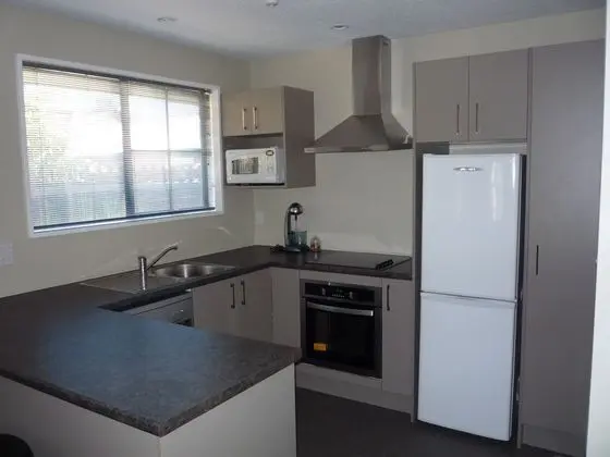 Metropolitan Executive Motel Apartments - Mutfak