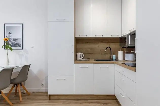 Mielno Wakacyjna Apartments by Renters - Mutfak