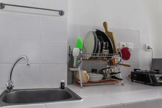 Minimalist and Comfy 1BR Apartment Scientia Residence - Mutfak