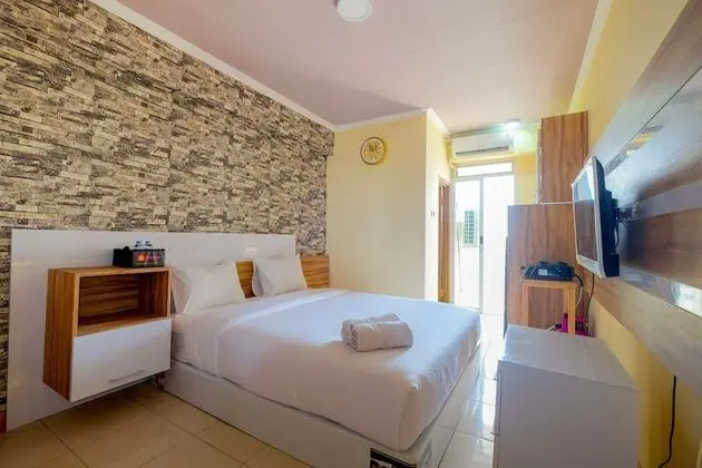 Minimalist and Comfy Studio at Pluit Sea View Apartment