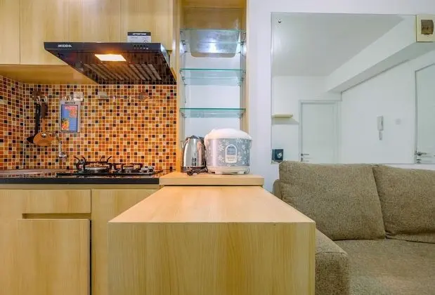Minimalist and Cozy Living 2BR at Bassura City Apartment - Mutfak