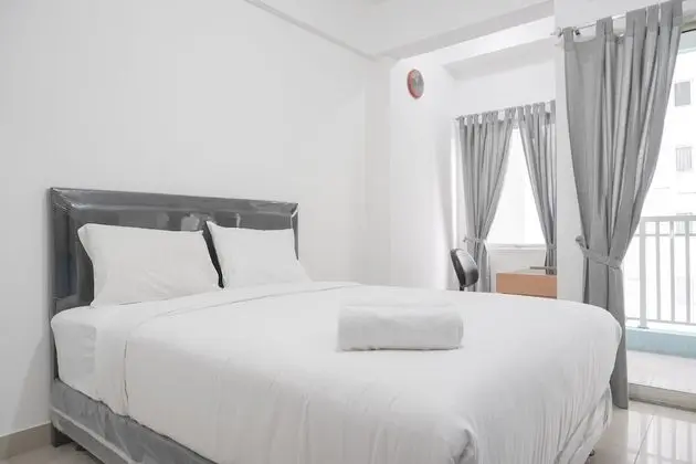 Minimalist And Cozy Studio Room At The Nest Puri Apartment