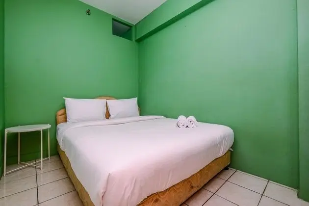 Minimalist And Cozy Style 2Br At Green Pramuka City Apartment