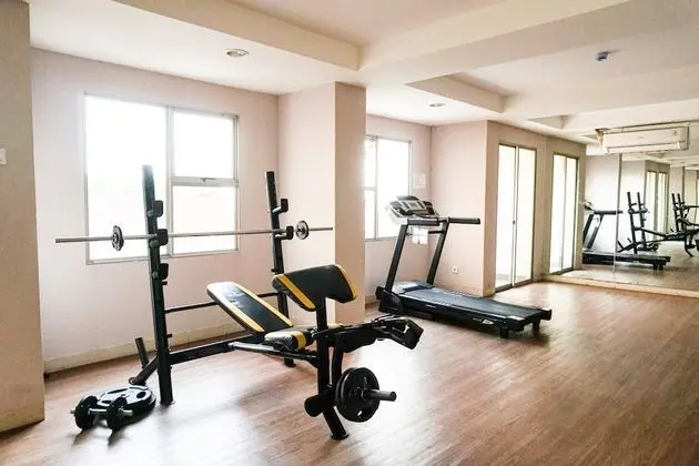 Minimalist And Homey 1Br At Belmont Residence Puri Apartment - Fitness