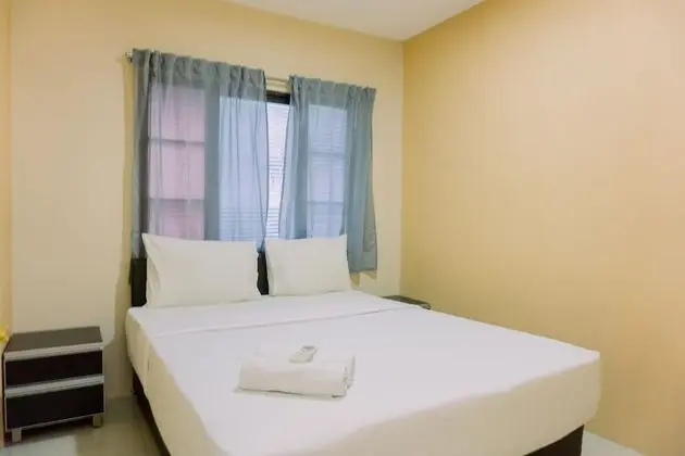 Minimalist And Homey 1Br At Puri Garden Apartment