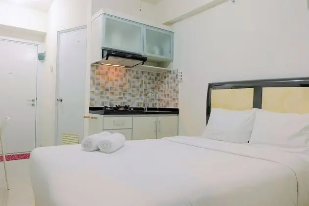 Minimalist Studio with City View at Green Pramuka Apartment