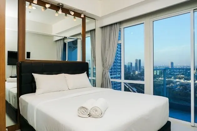 Minimalist Studio Room at Puri Mansion Apartment