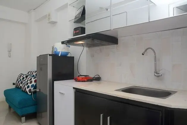 Minimalist and Stylish 1BR Bassura City Apartment - Lobi