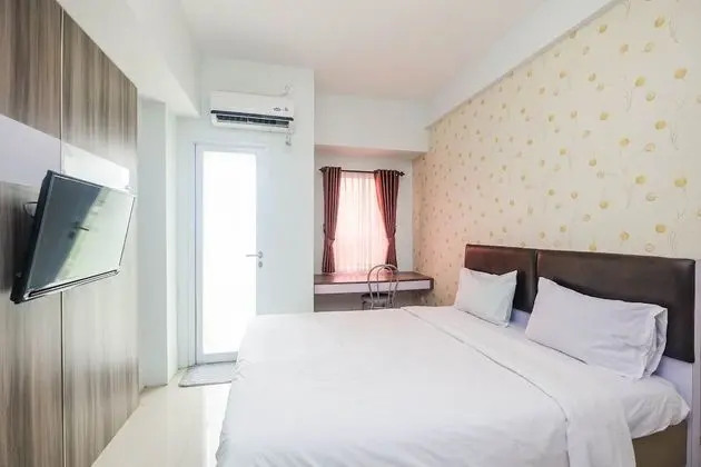 Minimalist Tamansari Mahogany Studio Apartment with City View
