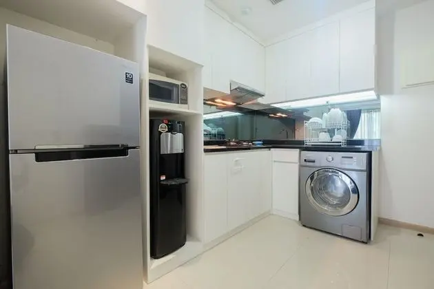 Modern 1BR Apartment at Casa Grande Residence - Mutfak