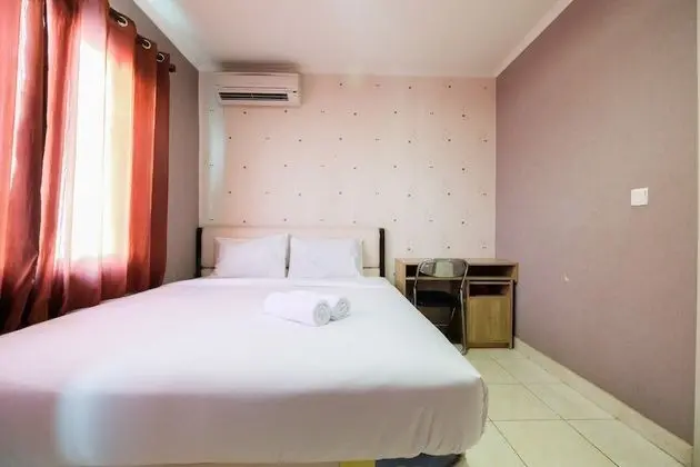 Modern 2BR at City Home Apartment with Sofa Bed near MOI