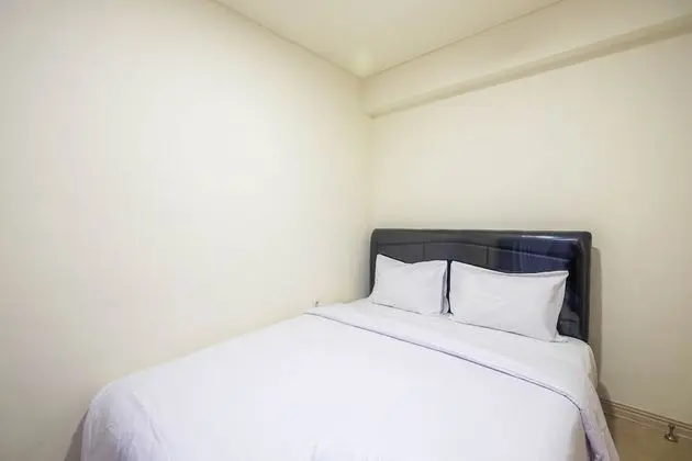 Modern 2BR Room at Meikarta Apartment By Travelio - Oda