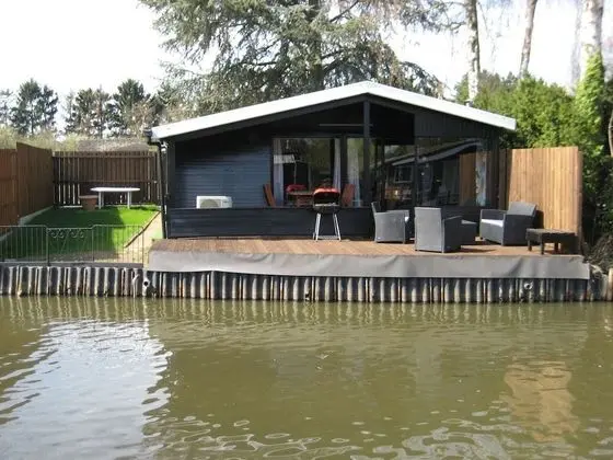 Modern Chalet in a Small Park, Located Right Along a Fishing Pond