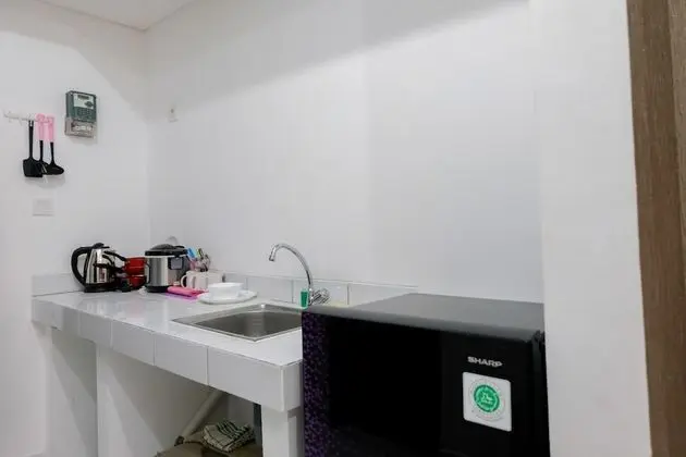 Modern & Comfy Studio @ Casa De Parco Apartment - Mutfak