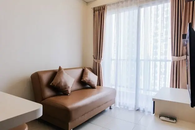 Modern Living 1BR at Saveria Apartment - Oda