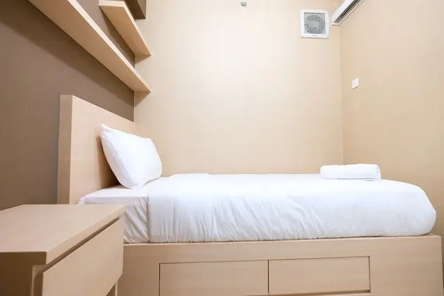 Modern Minimalist 2 Bedrooms at Bassura City Apartment By Travelio - Oda