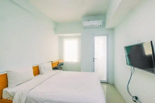 Modern Style Studio Tamansari Mahogany Apartment with City View - Öne Çıkan Resim