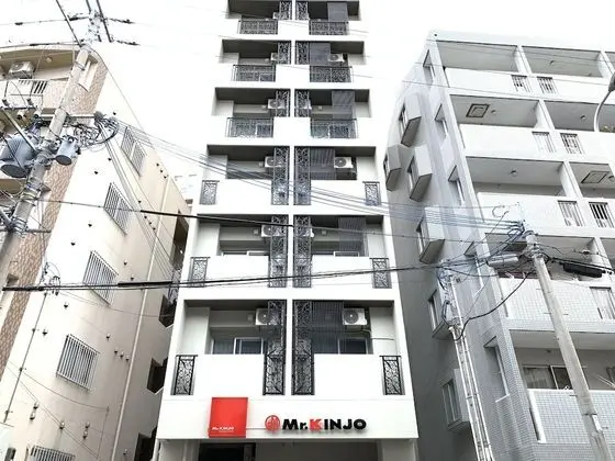 Mr.KINJO Miki24 in front of Makishi Station