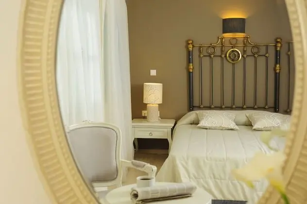 Mythos Suites Hotel - Oda