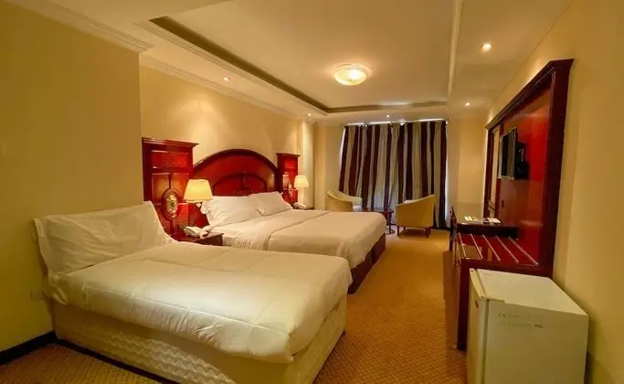 New Penninsula Hotel - Oda