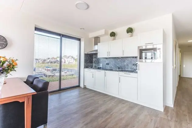 New and Tasteful Apartment With a Panoramic View Over the Marina - Mutfak