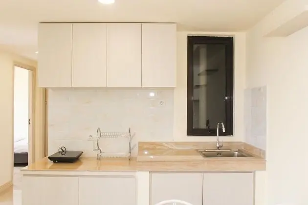 Nice and Comfy 3BR at Meikarta Apartment - Mutfak