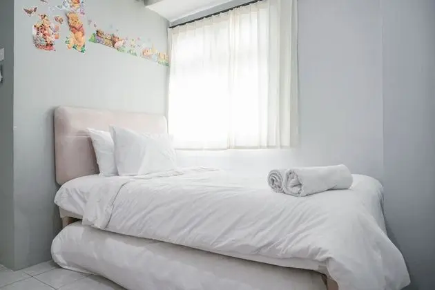 Nice And Cozy Living 2Br At Green Pramuka City Apartment