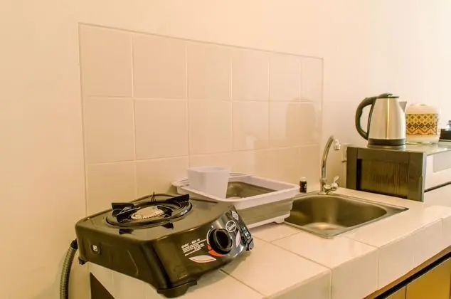Nice And Cozy Studio At Apartment M-Town Residence - Mutfak