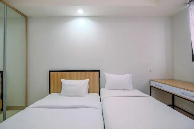 Nice and Cozy Studio Room at Evenciio Margonda Apartment - Oda