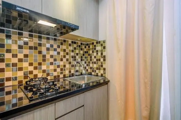 Nice And Fresh 2Br At Bassura City Apartment - Mutfak