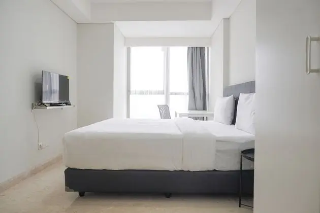 Nice And Homey 1Br At Gold Coast Apartment - Oda