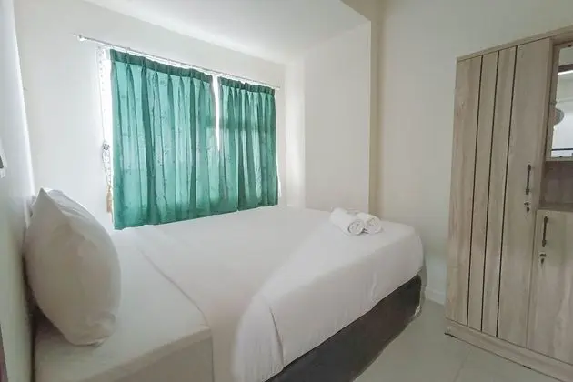 Nice And Homey 2Br At Vida View Makassar Apartment