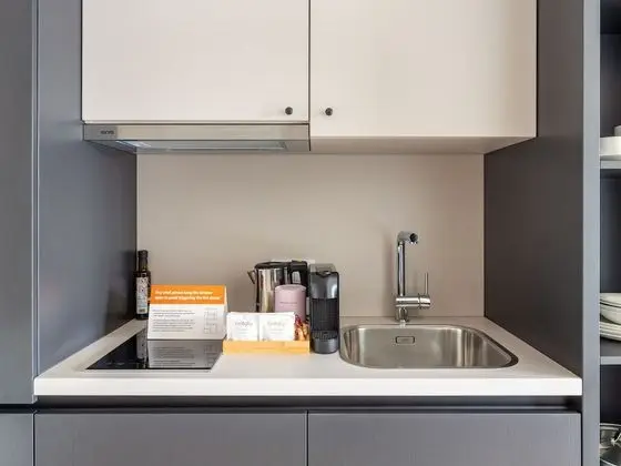 numa l Bloc Rooms & Apartments - Mutfak