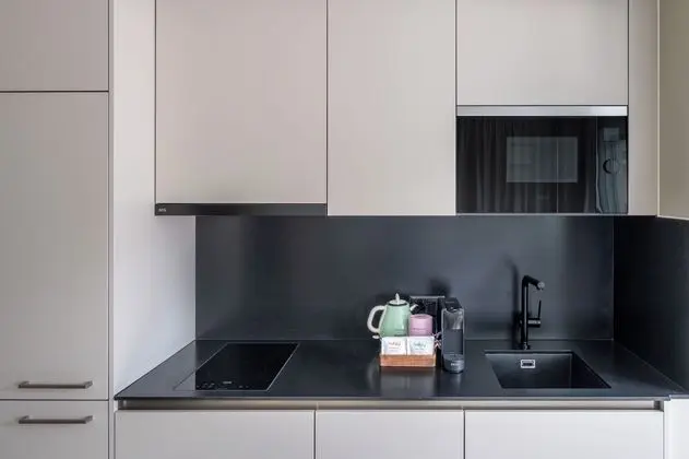 numa l Craft Apartments - Mutfak