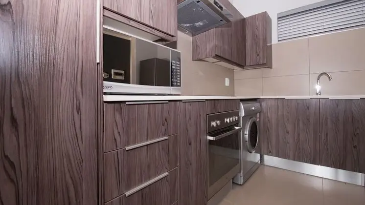 Odyssey Luxury Apartments - Mutfak