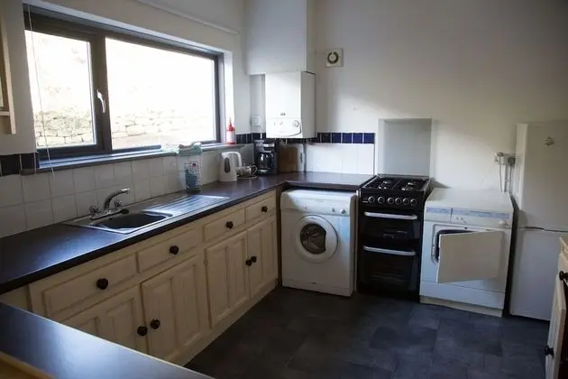 The Old Deanery Holiday Cottages - Mutfak